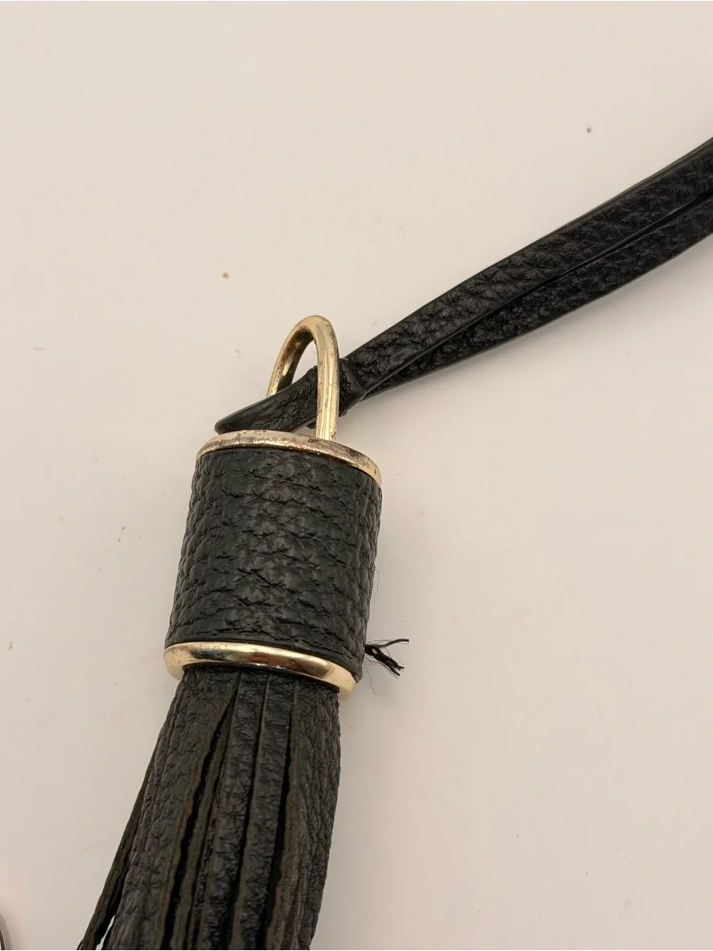 Marc Jacob’s Tassel and Zipper Pull, very good, black